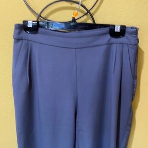 High waisted. Ankle length slacks.